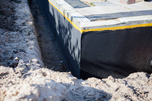 Professional Waterproofing technician working in Chase, PA